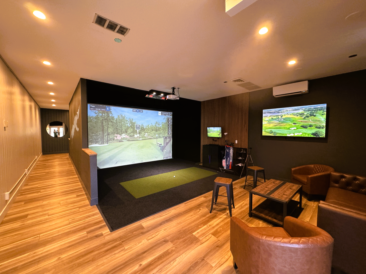 A two bay commercial facility in Lake Oswego that has a nice seating area to watch golf.