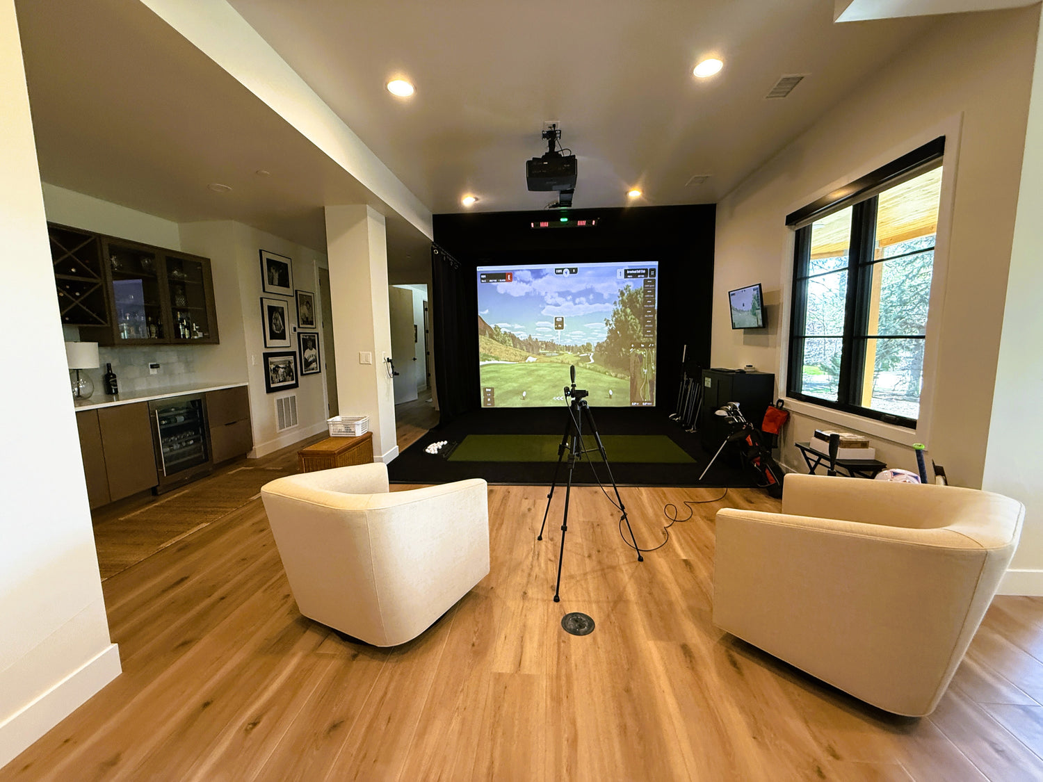 Golf simulator featuring the Uneekor EYEXO2 launch monitor