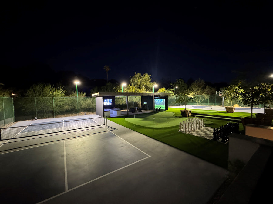 backyard view with a golf simulator