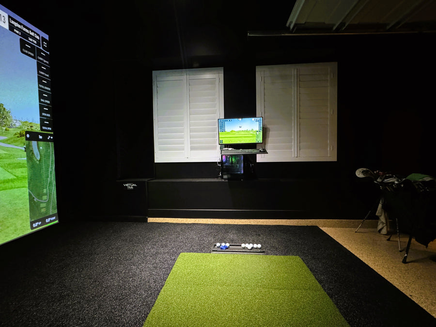 Custom golf simulator in a garage
