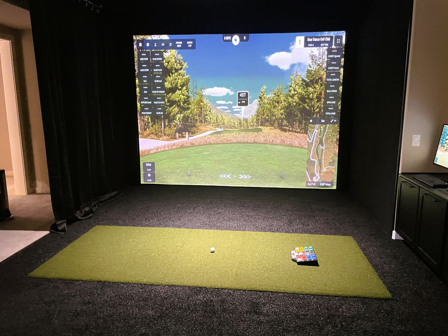 Indoor golf simulator in a basement.