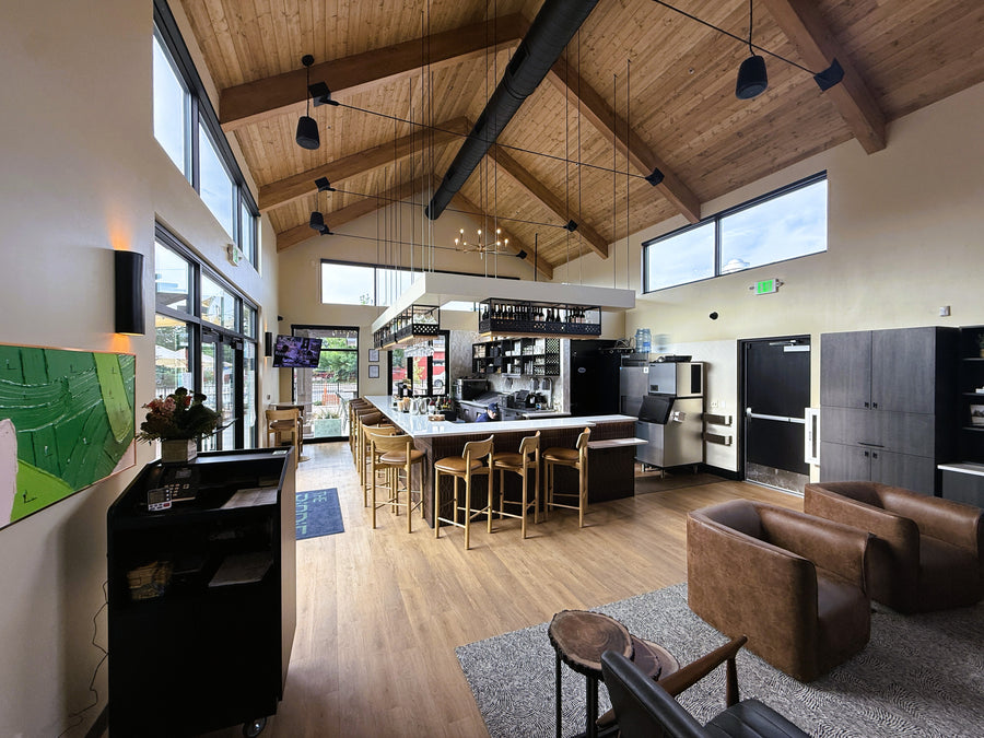 Modern kitchen with wooden beams and large windows