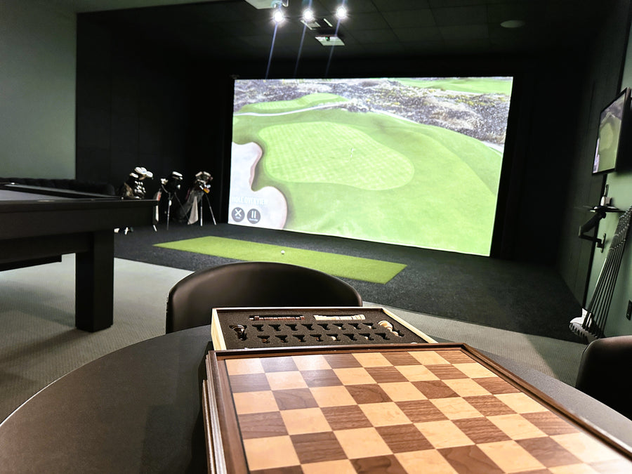 Trackman golf simulator in a basement