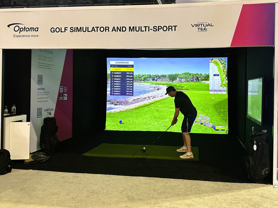 Optoma booth at Infocomm featuring a Virtual Tee golf simulator