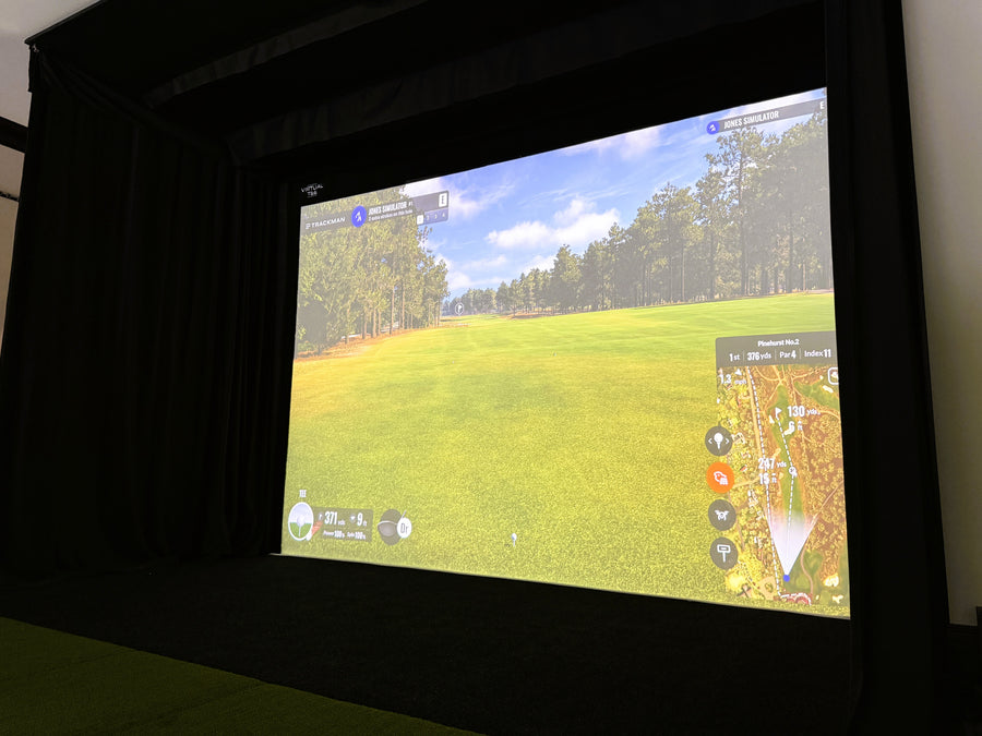 Golf simulation screen in a dark room