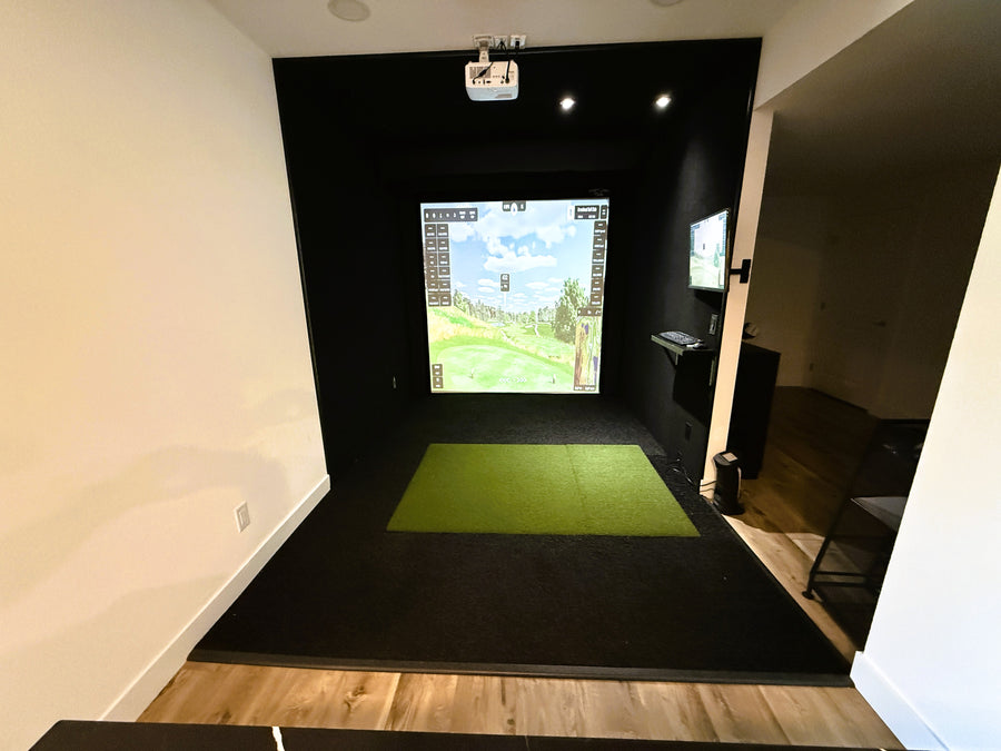 designer basement featuring a golf simulator