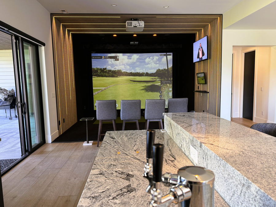 Golf Simulator setup with golf game being displayed on screen.