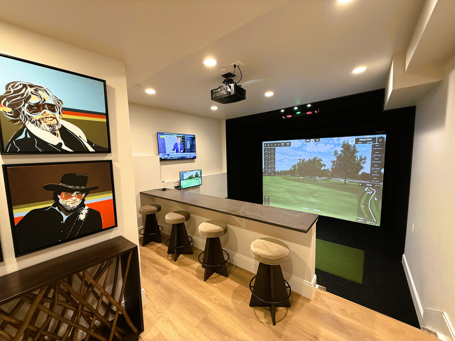 Golf Simulator with multiple screens displaying different content, including a golf simulation game.