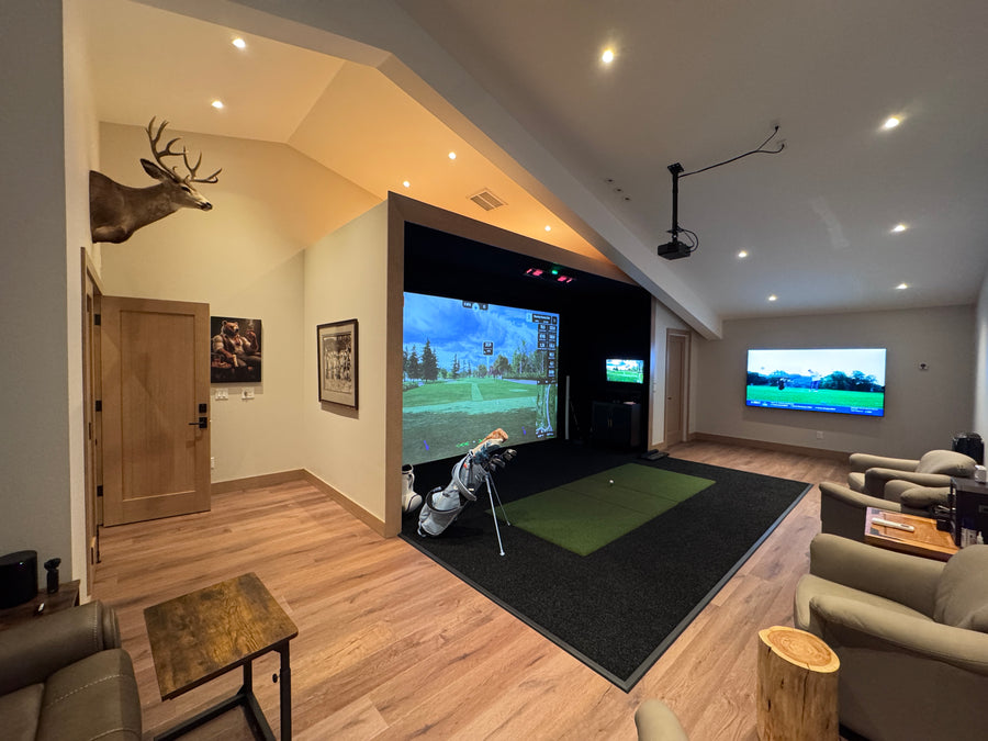 Golf Simulator entertainment room with a large screen displaying a golf simulation game.
