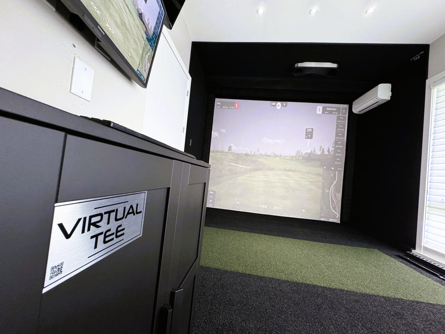 Golf simulator room with custom cabinet built with Virtual Tee branding. 