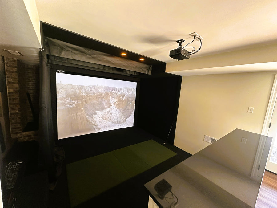 Indoor golf simulator with projector