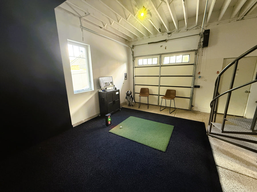 Garage golf simulator setup.