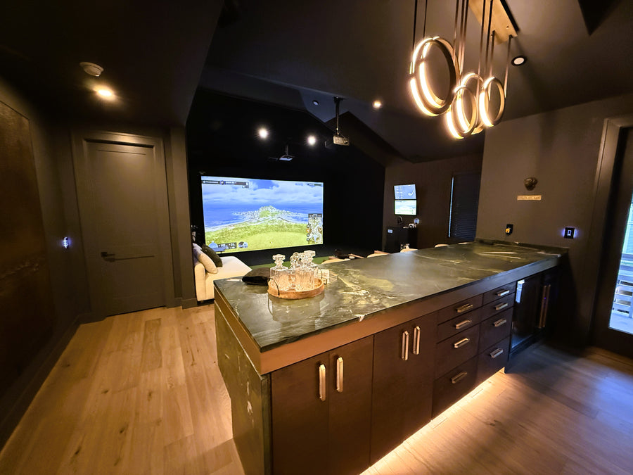 Modern kitchen with a large island and a Indoor golf simulator