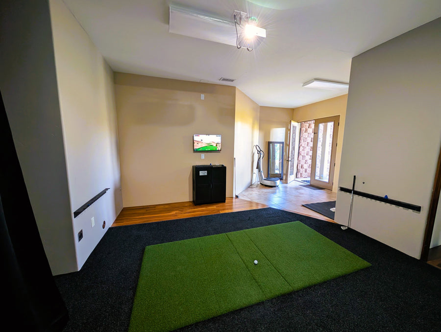 Looking back at hitting area of a golf simulator