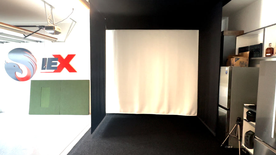 retractable golf simulator in garage