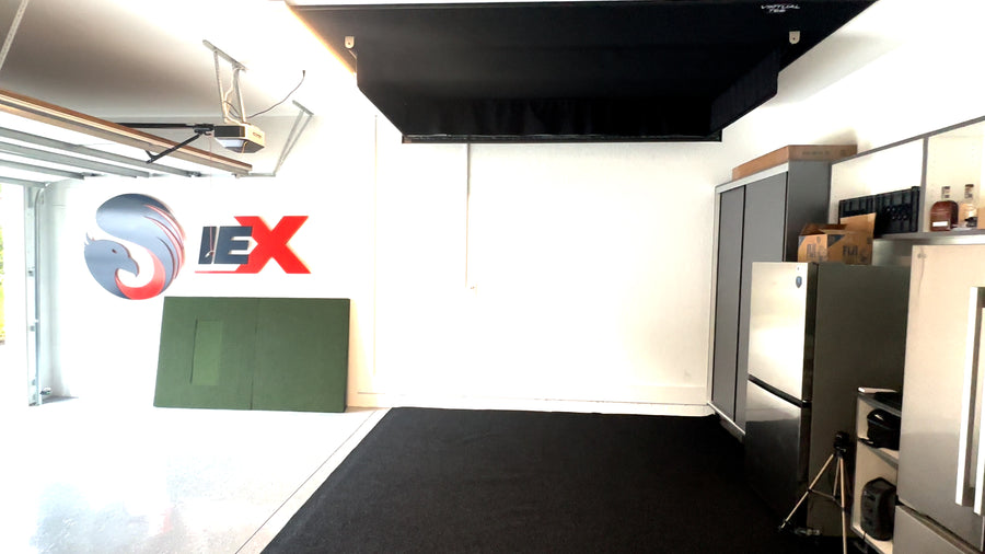 Modern garage with retractable golf simulator