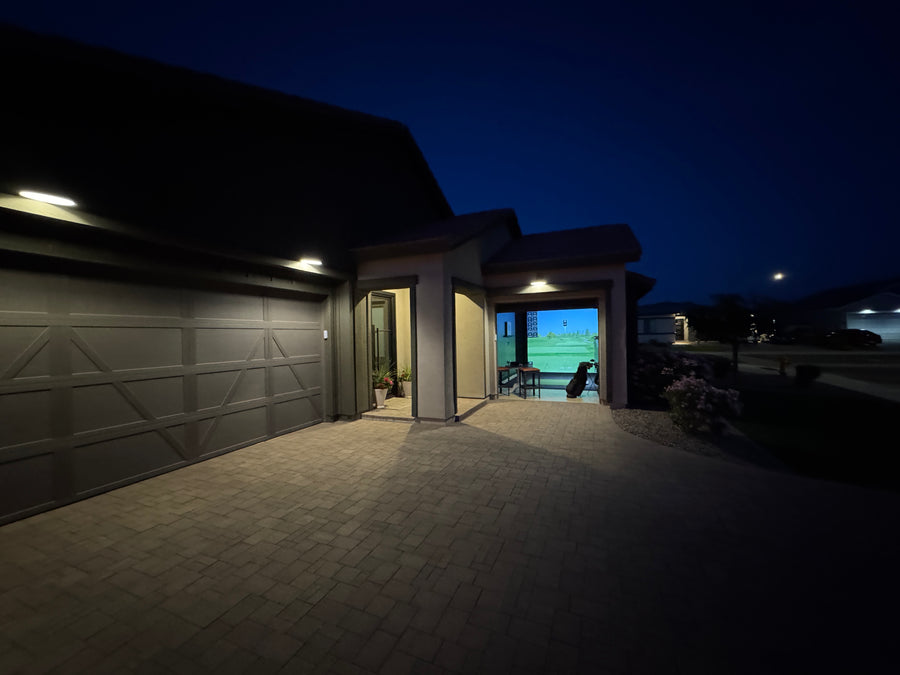 home golf simulator at night time