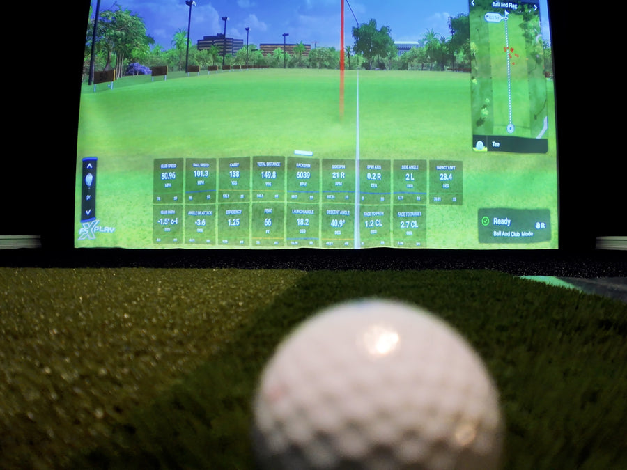 Home golf simulator featuring the Foresight Quad launch monitor
